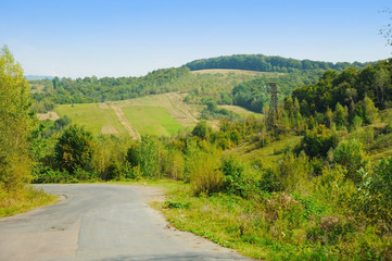 Fototapeta na wymiar Beautiful road among mountains. Transcarpathian region, Ukraine