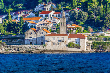 Fototapeta na wymiar Monastery by the sea Korcula. / Seafront view at dominican monastery by the sea in Korcula town, Croatia.