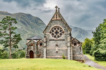 Fototapeta na wymiar Glenfinnan church in typical gray stone of Scotland