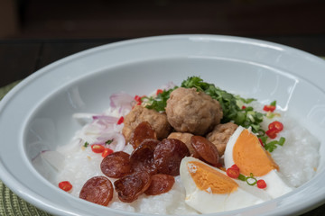 Close up Dried Rice Porridge with Salted-Fish Pork Balls.(selective focus)
