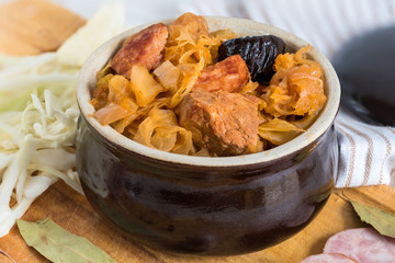 Bigos-traditional Polish dish of finely chopped meat, mushrooms, and sausage with sauerkraut and shredded fresh cabbage. The dish is also traditional for Belarusian, Ukrainian and Lithuanian cuisine.