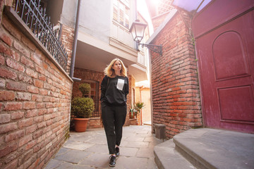 Tourist walks through the streets of Tbilisi © Tatyana Gladskih