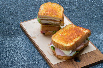 Close up chicken cordon bleu sandwich. (selective focus)
