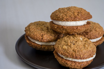 Close up Homemade Malt and Oat Cookie Sandwiches . (selective Focus)