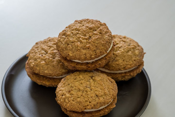 Close up Homemade Malt and Oat Cookie Sandwiches . (selective Focus)