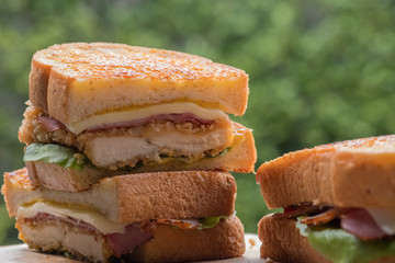 Close up chicken cordon bleu sandwich. (selective focus)