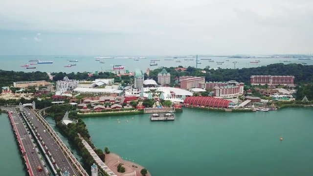 Singapore. November 21, 2017: Beautiful aerial footage of Sentosa Island Singapore from a drone flying forward. Shot in 4k resolution