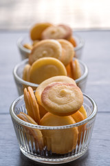 Close up Homemade White Chocolate Cat’s Tongue Cookies . (selective Focus)