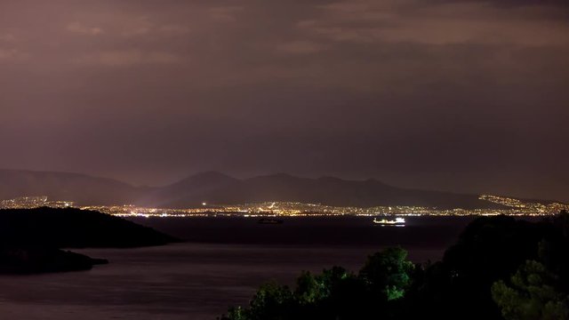 4K Timelapse at Salamina Island by night with airplane
