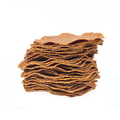 Dry and sheet of Soybean fermented on white background.