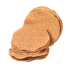 Dry and sheet of Soybean fermented on white background.