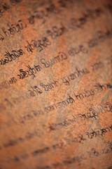 Sri Lanka, Anuradhapura. Ancient religious writings on the wall of temple