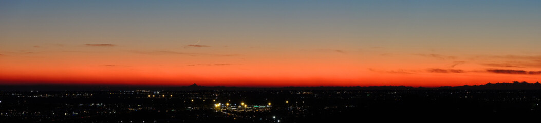 Obraz premium Fiery sunset from Bergamo city to the Po valley. Lombardy, Italy. Sunset during fall season.