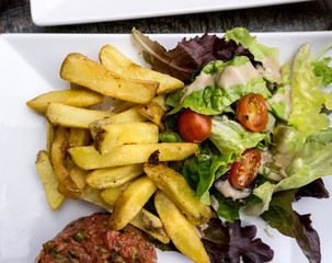 Golden French fries potatoes ready to be eaten
