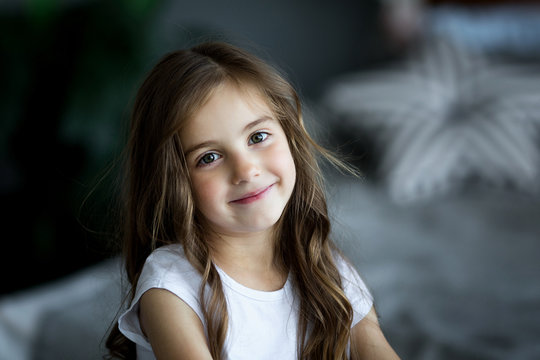 Portrait Of A Beautiful Smiling Little Girl