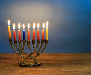 Hanukkah menorah with candles.