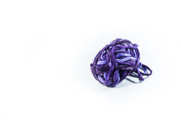 Purple yarns on isolated white