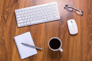 Modern office workplace with a cup of coffee