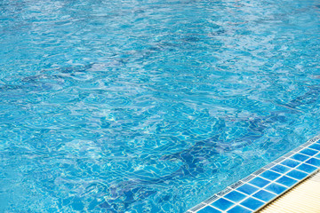 Fototapeta na wymiar Swimming pools and blue water