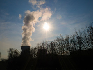 Pollution of the environment. The smoke from the chimney of the plant for processing of oil products