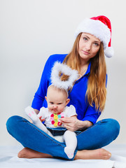 Christmas woman with cute baby.
