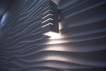 luminaire on a white undulating wall