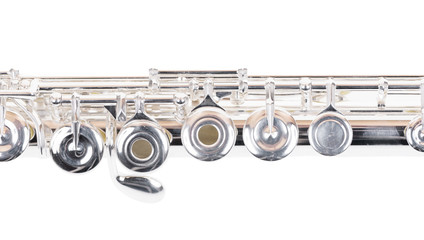 Silver flute detail. Musical instrument  isolated on white background. © Marek Walica
