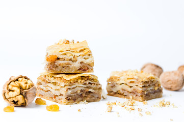Baklava dessert with nuts and raisins isolated