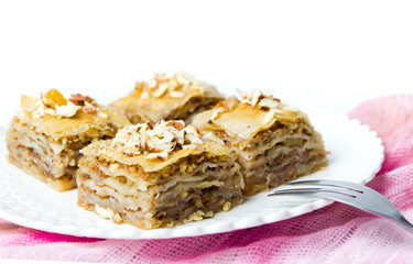 Baklava dessert slices on white background