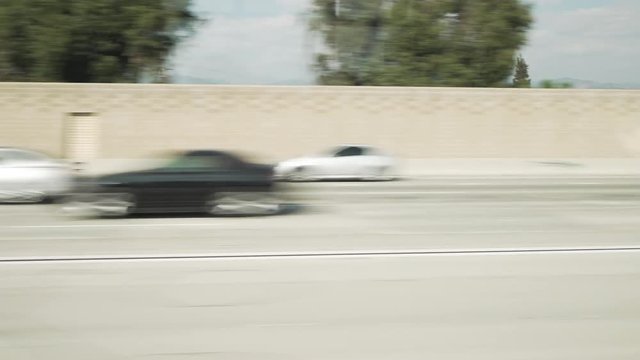 driving plate los angeles freeway side view