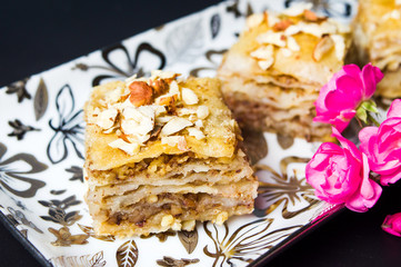 Baklava dessert slices on dark background