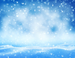 Winter background. Winter bright landscape with snowdrifts and falling snow.