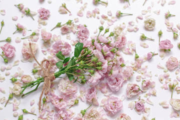 Flat lay, top view of small pink roses pattern.