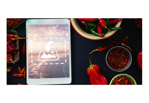 Top View Mockup of Tablet with Peppers and Spices