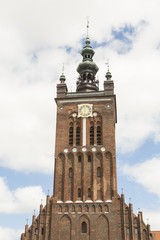 Fototapeta na wymiar Tower of St. Catherine's Church in Gdansk, Danzig in Poland