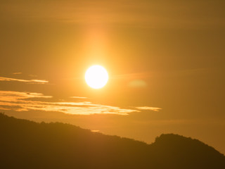 the beautiful  sky with cloudy background and silhouette mountain  with the sun