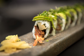 Sushi rolls with prawns on a stone plate