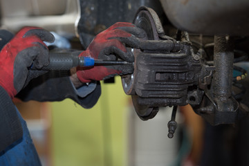 repair disc brake - hand brake, which have been replaced in the workshop or in the auto repair shop