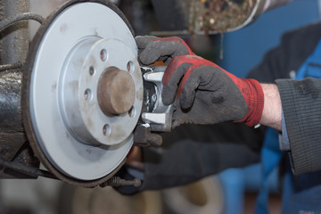 repair disc brake - hand brake, which have been replaced in the workshop or in the auto repair shop