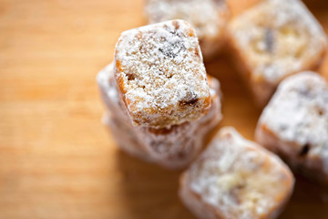 Christmas stollen slices with icing sugar, festive decoration