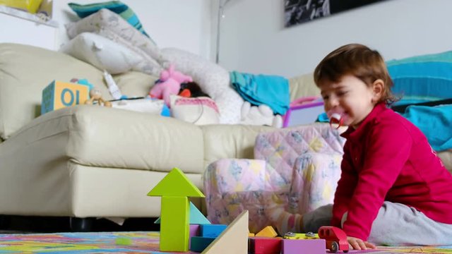 angry baby fails at construction blocks game - reaction emotion management in childrens
