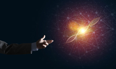 Science medicine and technology concepts as DNA molecule on dark background with connection lines