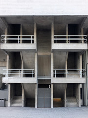 concrete staircases and walkways in an old brutalist type building