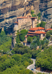 Mountain scenery with Meteora rocks and Roussanou Monastery, landscape place of monasteries on the rock.
