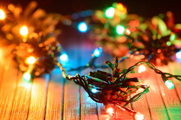 Glowing garland and pine cones