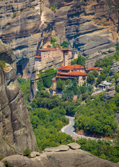Mountain scenery with Meteora rocks and Roussanou Monastery, landscape place of monasteries on the rock.
