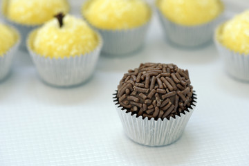 White tray of Brazilian candies with 