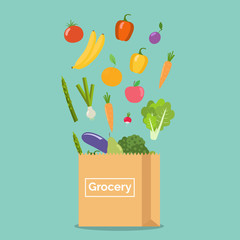 Vegetables and fruits in the paper bag. Grocery shopping