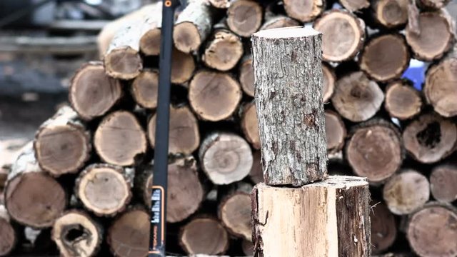 Wood Splitting in Winter Multiple Hits with an ax 