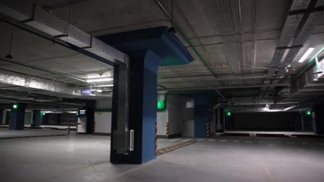 New modern empty underground parking garage for cars, auto park interior inside 